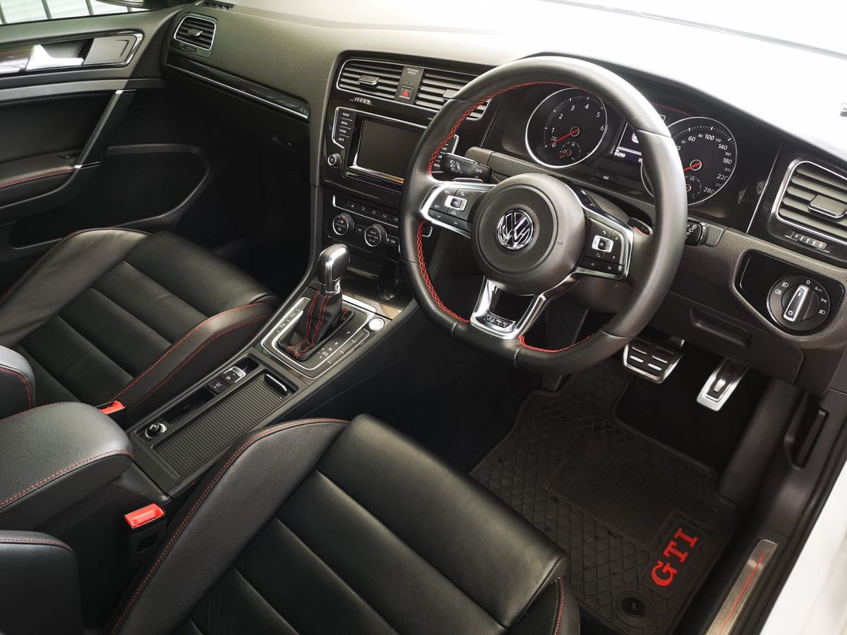 Stock + some GTI rubber mats for the winter